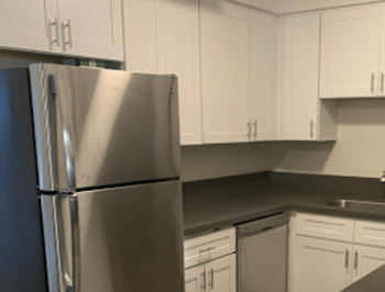 South Olive Apartments in Alhambra, California featuring newly renovated apartments with stainless steel appliances and wood-style flooring.